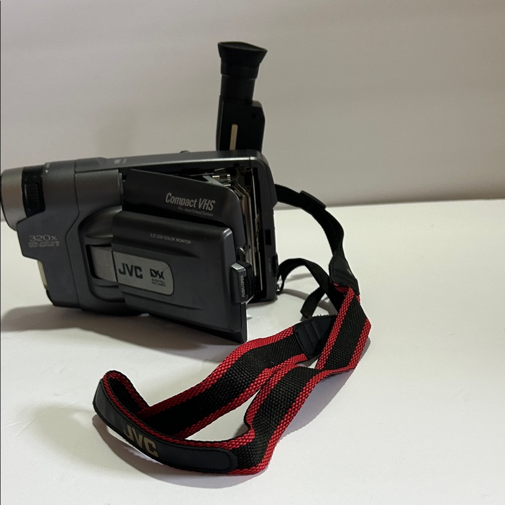 Compact VHS Camcorder in Gray with Red/Black Strap